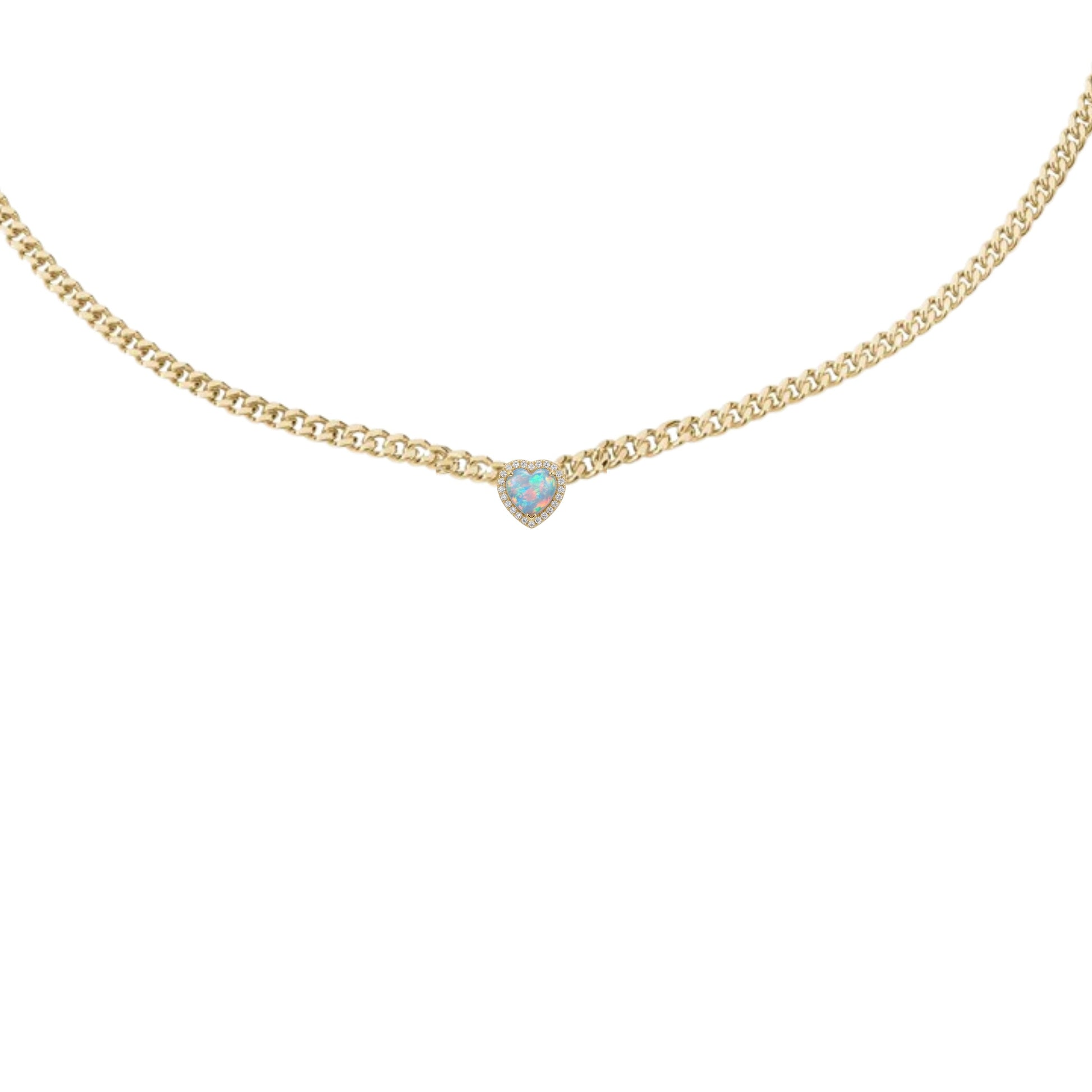 Gold necklace with a heart-shaped blue gemstone on a white background