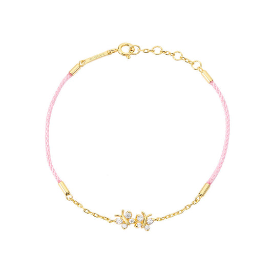 Enchanting Flutterfly™ gold vermeil butterfly bracelet on a pink silk cord; a luxury adjustable friendship bracelet for women by Bloomtine. Dainty pink silk cord butterfly bracelet in gold vermeil; Bloomtine's Flutterfly™ corded jewellery perfect for a summer jewellery stack. 