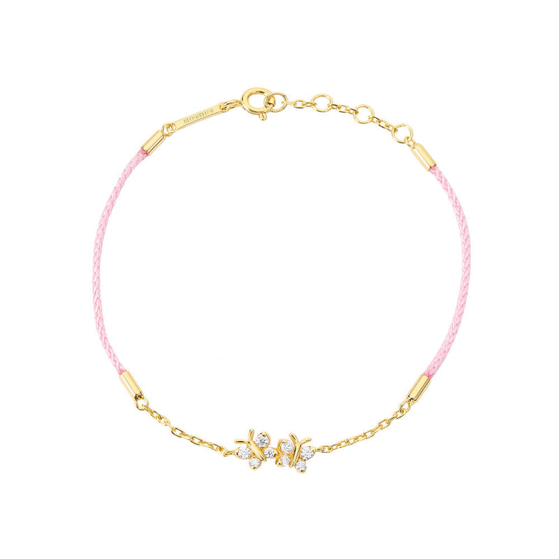 Enchanting Flutterfly™ gold vermeil butterfly bracelet on a pink silk cord; a luxury adjustable friendship bracelet for women by Bloomtine. Dainty pink silk cord butterfly bracelet in gold vermeil; Bloomtine's Flutterfly™ corded jewellery perfect for a summer jewellery stack. 