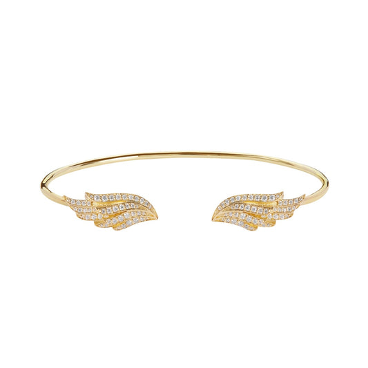 The BLOOMTINE Illuminess™ Angel Wing Bangle in Gold Vermeil. Featuring two intricately carved wings studded with shimmering lab-grown moissanites, this protective talisman bracelet represents the 'Extraordinary Human' spirit in a high-luster gold finish