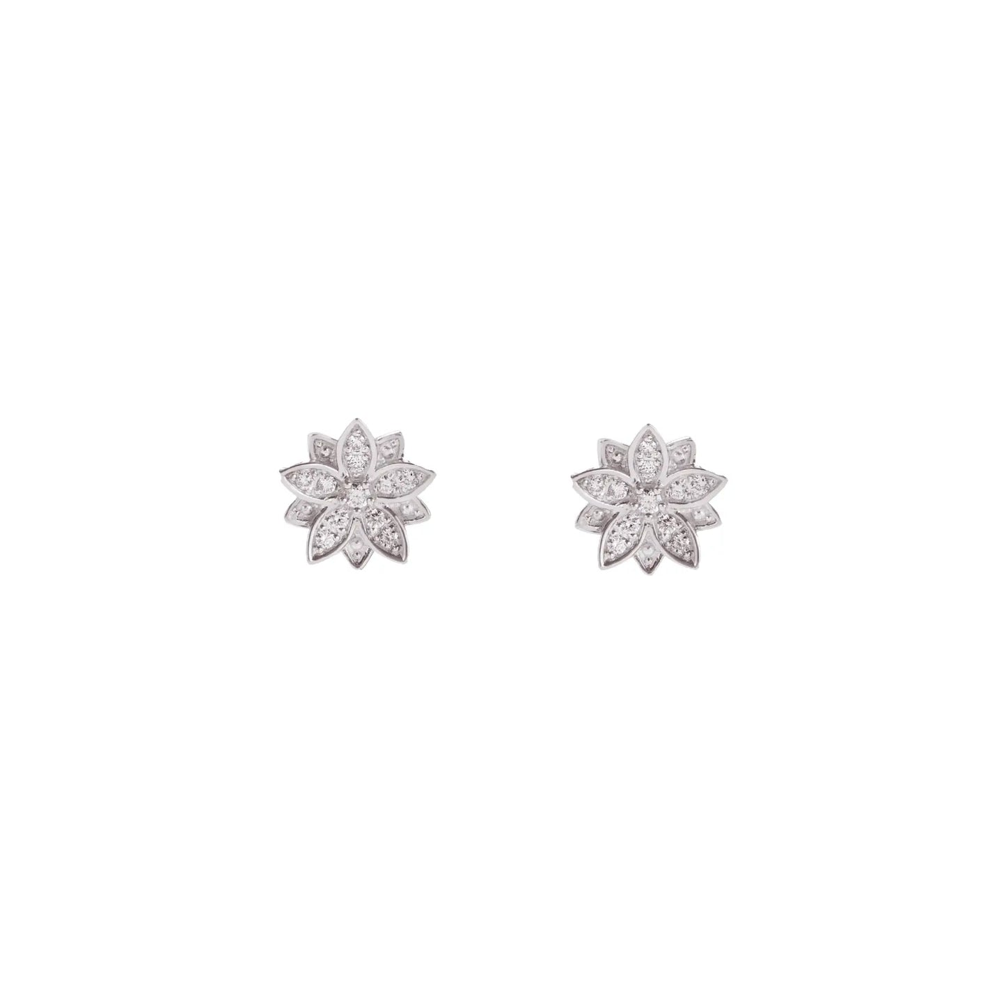 A macro close-up of the BLOOMTINE Eternal Bloom 14K white gold earrings. A pair of 3D layered diamond lotus earrings featuring 12 encrusted round VS1 diamonds with secure butterfly push backs.