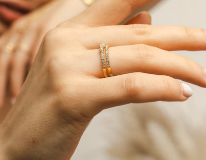 A BLOOMTINE Illuminess™ Combi Ring in gold vermeil. This exclusive two-in-one design fuses a bezel-set moissanite solitaire with a pavé-set band, offering a perfectly pre-styled stack. Finished in tarnish-resistant white rhodium for a mesmerizing, mirror-like glow.