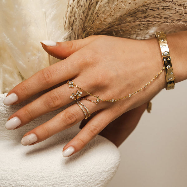 Heavyweight 35g gold vermeil star-set bangle by BLOOMTINE. Hand-set with sustainable moissanite 4-point and 8-point stars, this tarnish-resistant 'You are Magic' bracelet is the ultimate luxury gift for career milestones and new business ventures