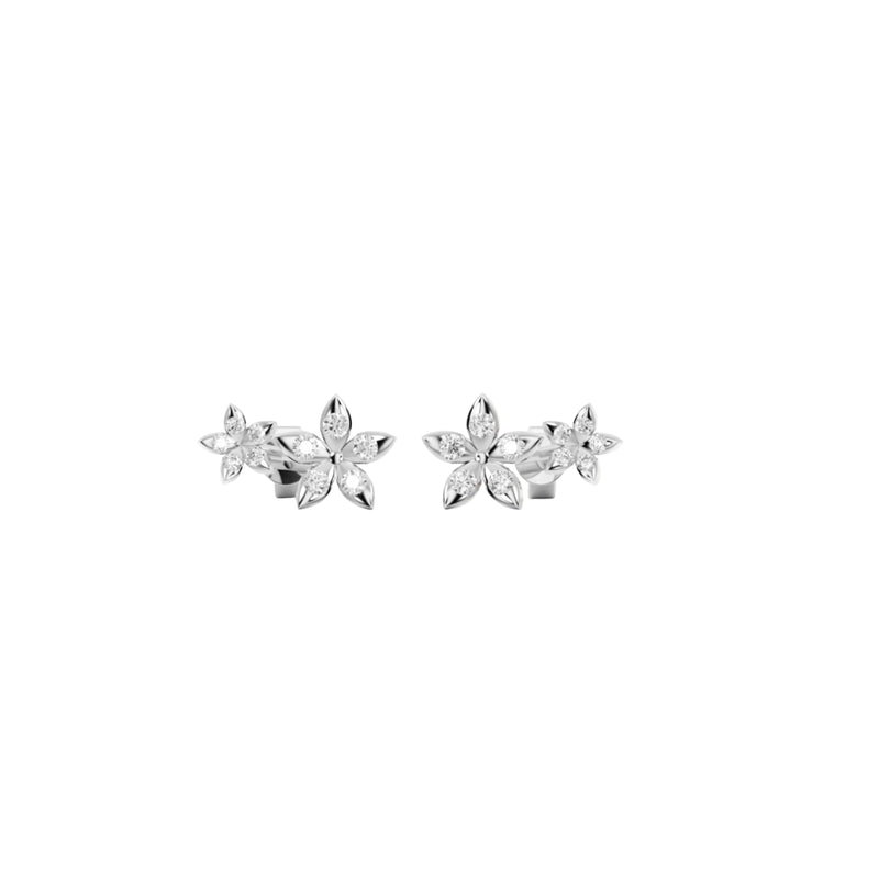 Bloomtine-mini-eternal-bloom-studs-earrings. A high-resolution-product-shot of 925-sterling-silver-flower-studs featuring a dainty-botanical-blossom-design. These-minimalist-silver-earrings are crafted-from-genuine-solid-sterling-silver for a high-shine-finish. This-elegant-pair of silver-flower-studs is the perfect-flower-earring-gift-idea for bridesmaids-or-birthdays, shown-on-a-clean-white-background to highlight the-delicate-petals and professional-craftsmanship of the Bloomtine-sterling-silver-collecti