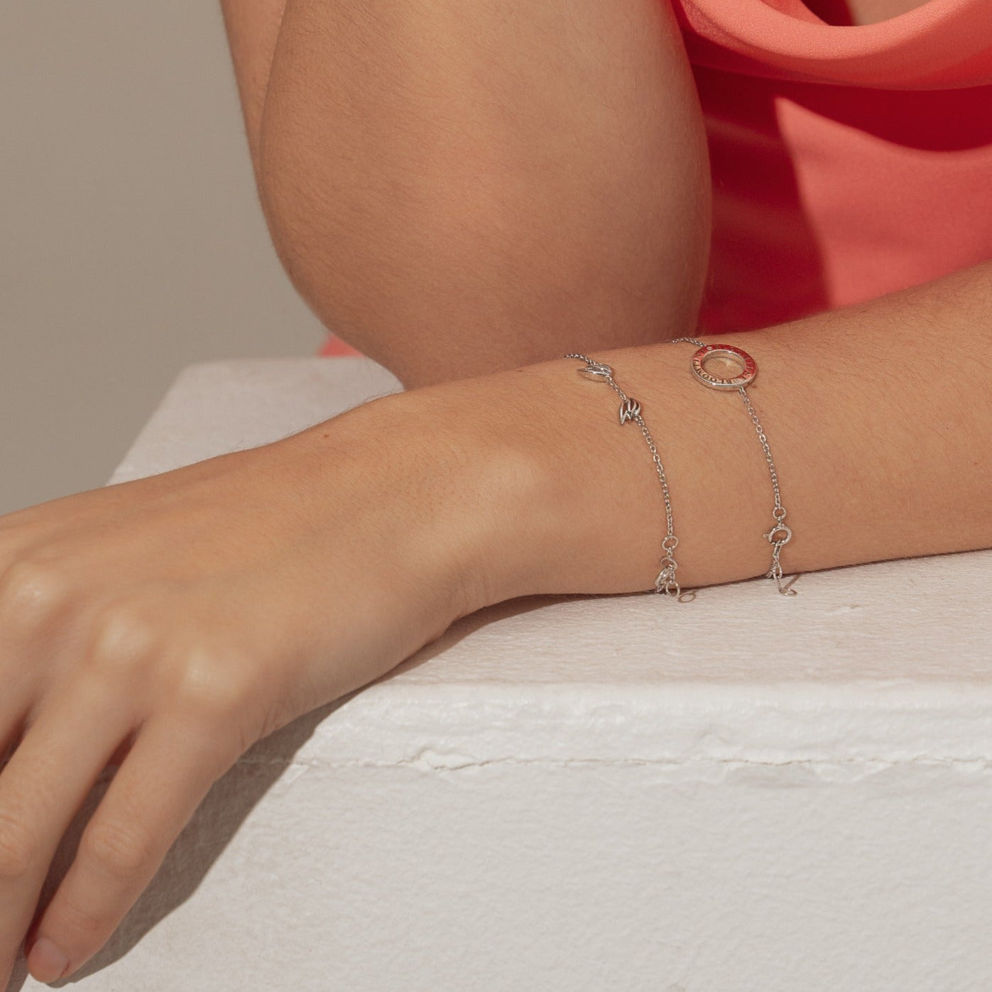 A dual-view shot of the BLOOMTINE Mini Halo Wings™ Bracelet in tarnish-resistant sterling silver. The front displays a shimmering lab-diamond halo, while the back reveals the signature dual-wing design on the wrist, showcasing BLOOMTINE’s extraordinary 360-degree craftsmanship