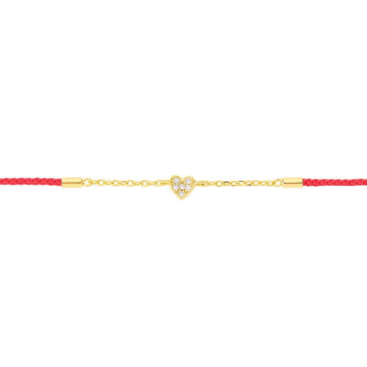 BLOOMTINE Mini Heart gold heart string bracelet in 14K gold vermeil. An adjustable luxury silk cord bracelet featuring a dainty moissanite heart charm