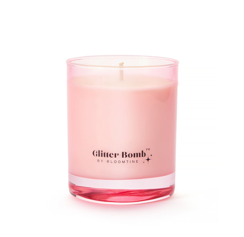 Sparkle-nova | Glitter Bomb™ Luxury Gift Candle in Bergamot, Cedar and Rose 230g image 0. The-Glitter-Bomb-Gift-Candle by Bloomtine. A professional-hero-shot of an-opulent-pink-iridescent-glass-jar filled-with-creamy-natural-soy-wax. This-luxury-30cl-candle features a-sophisticated-scent-profile of Bergamot, Velvet-Rose, and Cedarwood. Designed-in-London, it represents-the-perfect-minimalist-gift for home-decor-enthusiasts seeking-high-end-fragrance