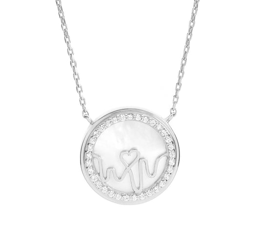 Bloomtine-Loves-Frequency-sterling-silver-heartbeat-locket. A professional-hero-shot of a 925-sterling-silver-heart-locket featuring an-intricate-heartbeat-rhythm-design embellished-with-multiple-sparkling-gemstones. This-sentimental-pendant is centered-on-a-clean-white-background, showcasing its-high-polish-finish and fine-engraved-details. As-the-lead-piece of the Loves-Frequency-collection, this-multi-gemstone-necklace represents-a-meaningful-gift for anniversaries, birthdays, or special-milestones, comb