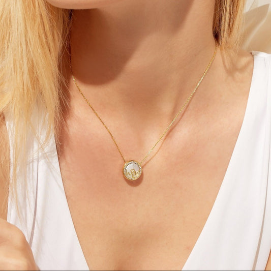 Bloomtine-Loves-Frequency-sterling-silver-locket-image-3. A detailed-alternative-view of the 925-sterling-silver-heartbeat-locket, showcasing the-precision-setting of multiple-gemstones along the-rhythm-line. This-angle highlights the-depth-of-the-locket and its-luminous-polished-silver-finish against a clean-white-background. Perfect-as-a-personalized-gift-for-her, this-image-reveals the-premium-craftsmanship and delicate-proportions of the Loves-Frequency-pendant-collection.